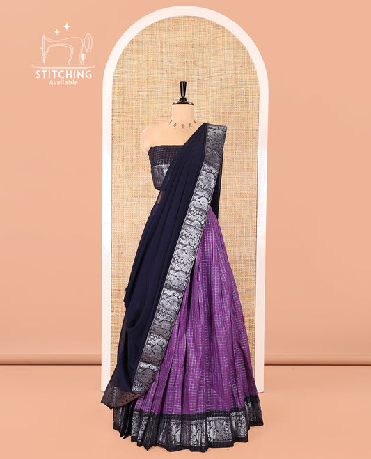 Purple and Navy Blue Sungudi Cotton Half-Saree, Gleamed Up with Micro-Zari Checks on Its Skirt, Complemented by a Contrast Peacock Zari Border, Paired with a Contrast Blouse, and a Contrast Syska Georgette Zari-Bordered Dhavani