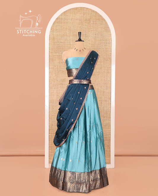 Sea Green and Blue Semi-Banarasi Half-Saree, Elevated with Zari Buttas on Its Skirt, Complemented by a Contrast Traditional Zari-Design Border, Paired with a Matching Blouse, and a Contrast Satin Georgette Zari-Bordered Dhavani