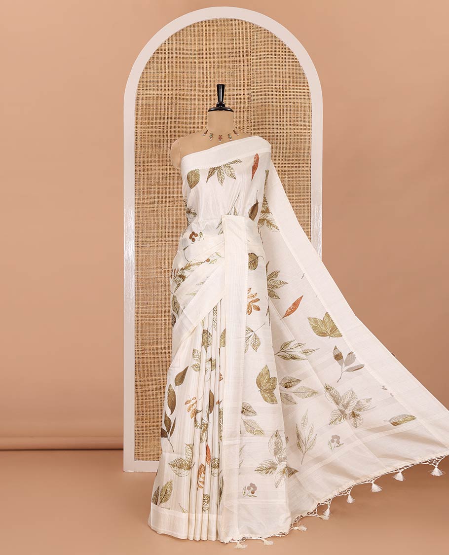 Off-White unique size and shaped leaf motifs printed fancy tussar saree, resham thread woven border, leaf motifs printed pallu, and a matching striped blouse