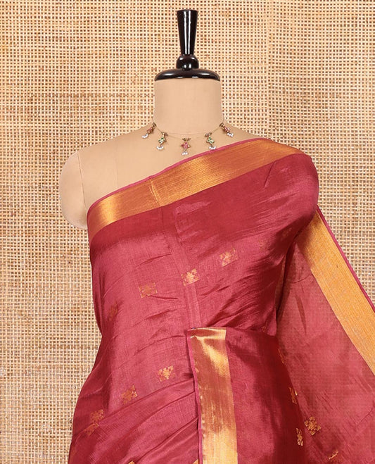 Onion pink zari buttas banana pith silk saree, zari bavanji border, zari striped pallu, and a matching zari design blouse