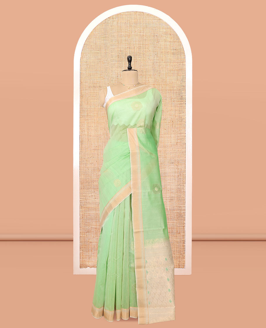 Light Pista Green Silk Cotton Saree, Subtly Sparkled with Zari Buttas, Contrast Zari Border, Intricate Pallu, and a Contrast Blouse