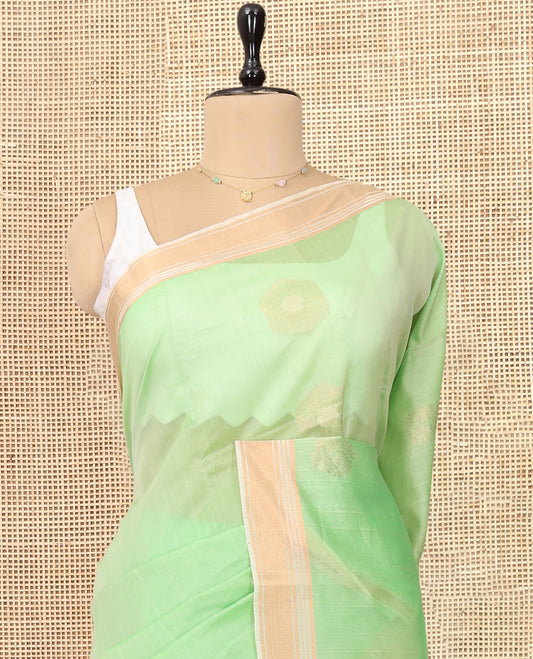 Light Pista Green Silk Cotton Saree, Subtly Sparkled with Zari Buttas, Contrast Zari Border, Intricate Pallu, and a Contrast Blouse