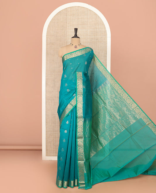 Blue Silk Cotton Saree Prettified with Floral Buttas All Over the Body, Complemented by a Contrast Floral Creeper Border, Featuring a Contrast Pallu of Floral Zari Designs, and Paired with a Contrast Blouse