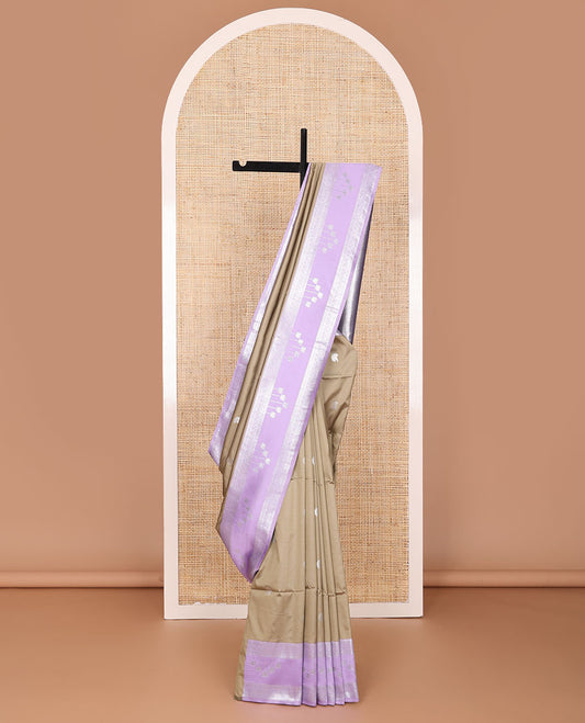 Pale brown semi-soft silk saree with zari buttas, contrast violet zari border of traditional designs, & pallu of intricate designs