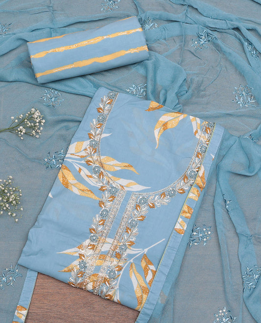 Blue Material Churidar Set, Decorated with Tropical Floral Print and Neck Threadwork Cotton Top, Printed Bottom, and Floral-Thread Embroidered Chiffon Dupatta