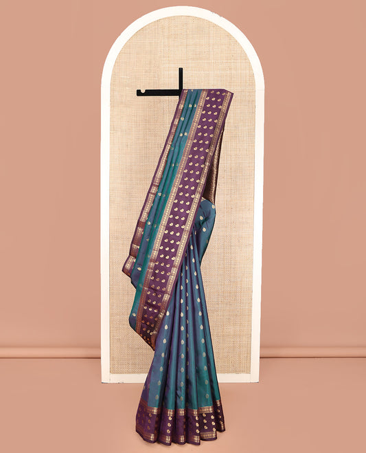 Blue Vasundhara Lite Silk Mix Saree, Accentuated with Zari Buttas on Its Body, Complemented by a Contrast Border of Rekku, Neli, Chakram, and Mayil Designs, Intricately Designed Pallu, and Paired with a Contrast Blouse