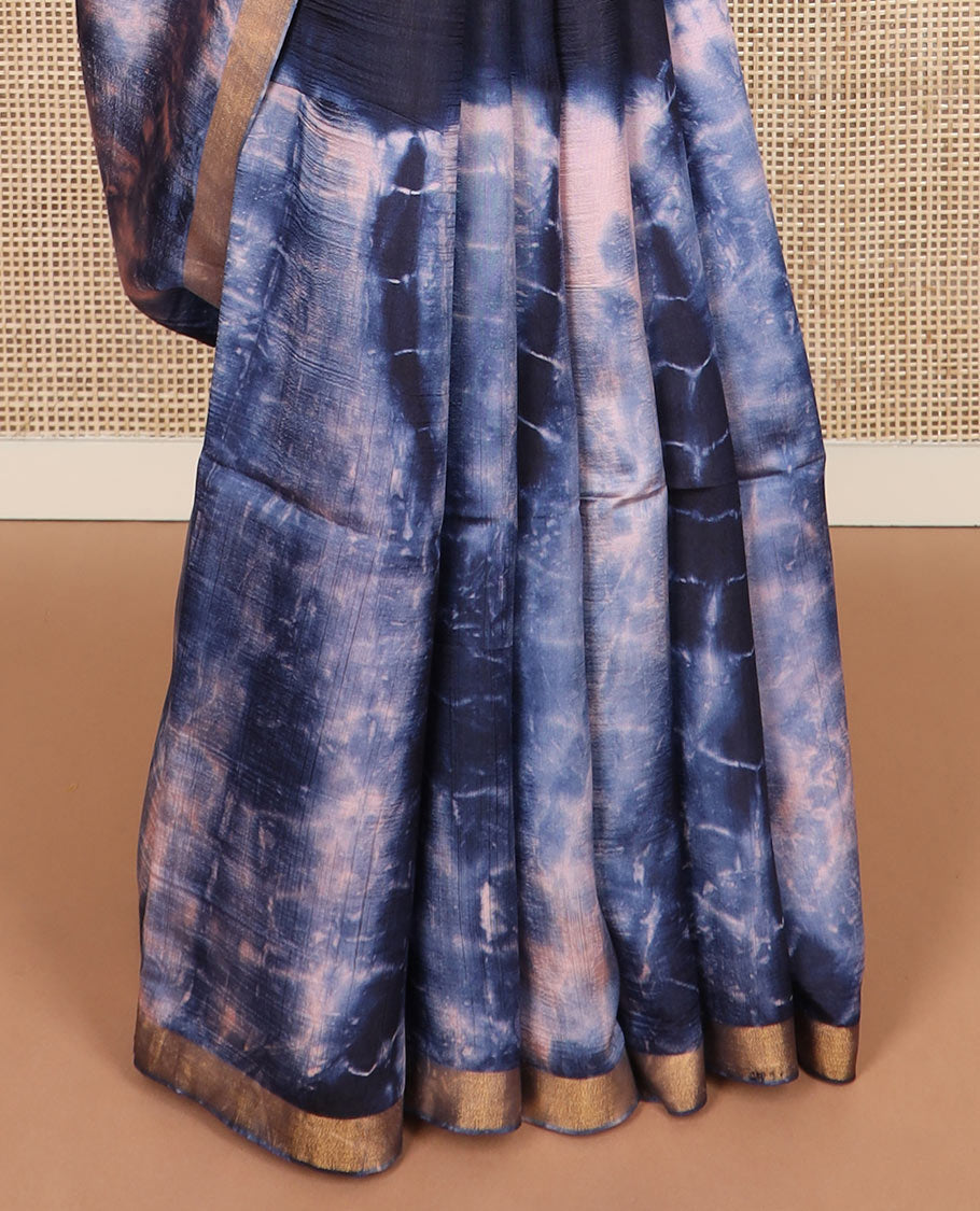 Blue shibori printed banana pith saree, zari piping border, and shibori printed pallu