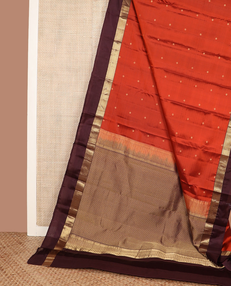 Orange zari buttas silk saree, contrast border of reeku, banaras, and ara maadam designs, and jaal pallu