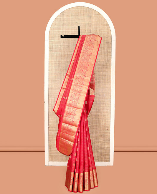 Red Vasundhara Silk Saree, Elegantly Highlighted with Zari Buttas, Highlighted by a Vanasingaram-Style Zari Vanki Border, Jaal Pallu, and a Matching Blouse