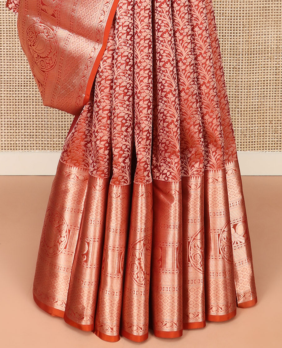 Rust Orange Kanchipuram Silk Saree Elegantly Designed with Jacquard Design, Highlighted with Zari Border of Thilakam, Muthu, Kodi Visiry, Jaal, Manga, and Mayil Designs, Majestically Detailed Pallu, and Paired with a Matching Blouse