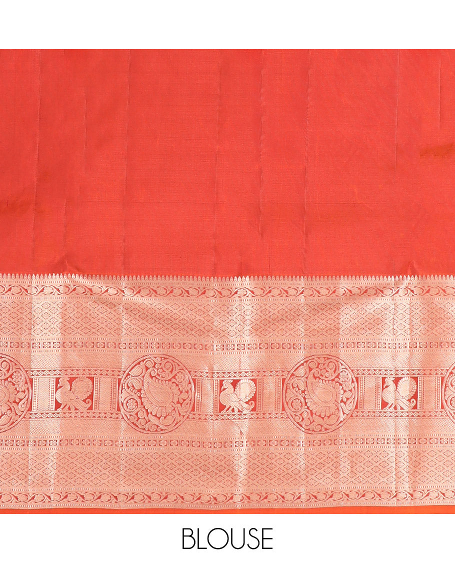 Rust Orange Kanchipuram Silk Saree Elegantly Designed with Jacquard Design, Highlighted with Zari Border of Thilakam, Muthu, Kodi Visiry, Jaal, Manga, and Mayil Designs, Majestically Detailed Pallu, and Paired with a Matching Blouse