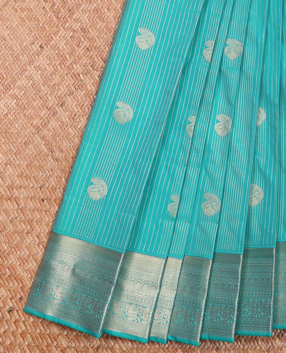 Blue Budget Silk Saree Decorated with Zari Stripes and Paisley Buttas, Highlighted with a Traditional Zari Border, Zari Elevated Jaal Pallu, and Paired with a Matching Blouse