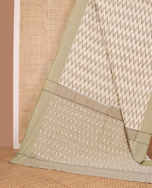 Beige chevron striped ikkat cotton saree, contrast plain khaki border, and ogee patterned pallu