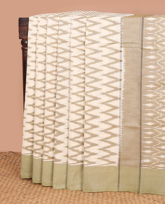 Beige chevron striped ikkat cotton saree, contrast plain khaki border, and ogee patterned pallu