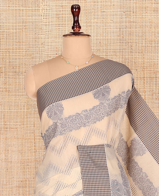 Sandal Semi-Silk Cotton Saree, Gleamed Up with Chevron Stripes All Over Its Body, Complemented by Contrast Micro-Checked Border, Pallu of Jaal Designs, and Paired with a Matching Blouse