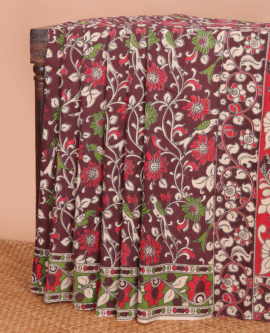 Brown floral vine & bird machine-printed kalamkari cotton saree, contrast floral creeper printed border & pallu of peacock print