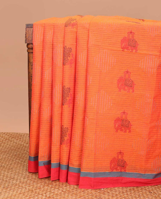 Orange geometric and animal motifs printed Coimbatore cotton saree, contrast border, and pallu of elephant, peacock and leaf motifs