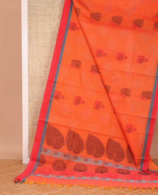 Orange geometric and animal motifs printed Coimbatore cotton saree, contrast border, and pallu of elephant, peacock and leaf motifs