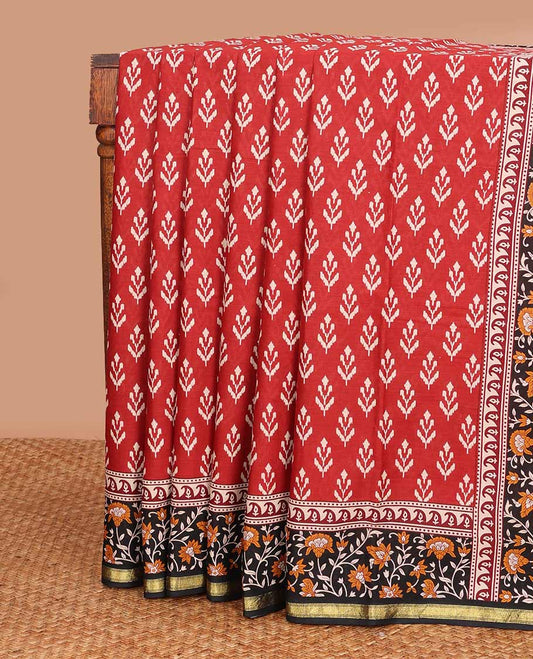 Red unique motifs printed mul mul cotton saree, contrast floral vine printed border, and pallu of floral print