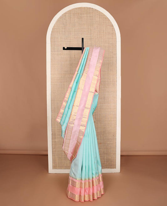 Blue mayil chakram buttas Kanchipuram silk saree, contrast rettai pettu border of thazampoo rekku, and kodi visiry, and paai madi pallu