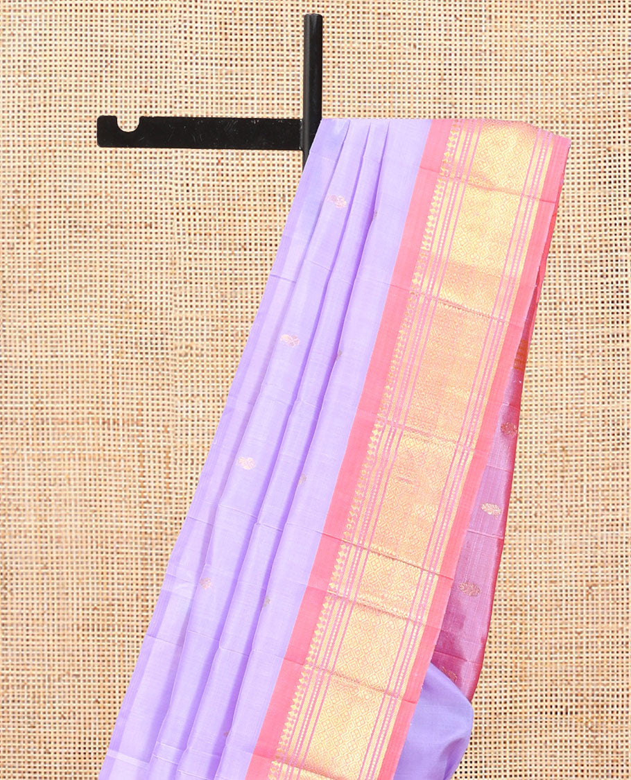 Lavender Kanchipuram Silk Saree, Embellished with Zari Buttas, Complemented by a Contrast Border of Panner Sombu, Banaras, Muthu, and Jaal Design, Zari Design Pallu, and No Blouse