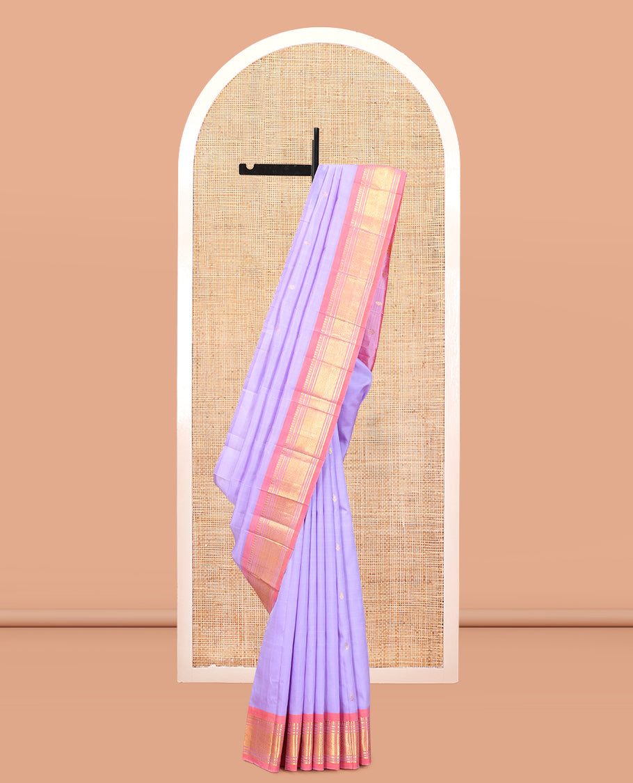 Lavender Kanchipuram Silk Saree, Embellished with Zari Buttas, Complemented by a Contrast Border of Panner Sombu, Banaras, Muthu, and Jaal Design, Zari Design Pallu, and No Blouse