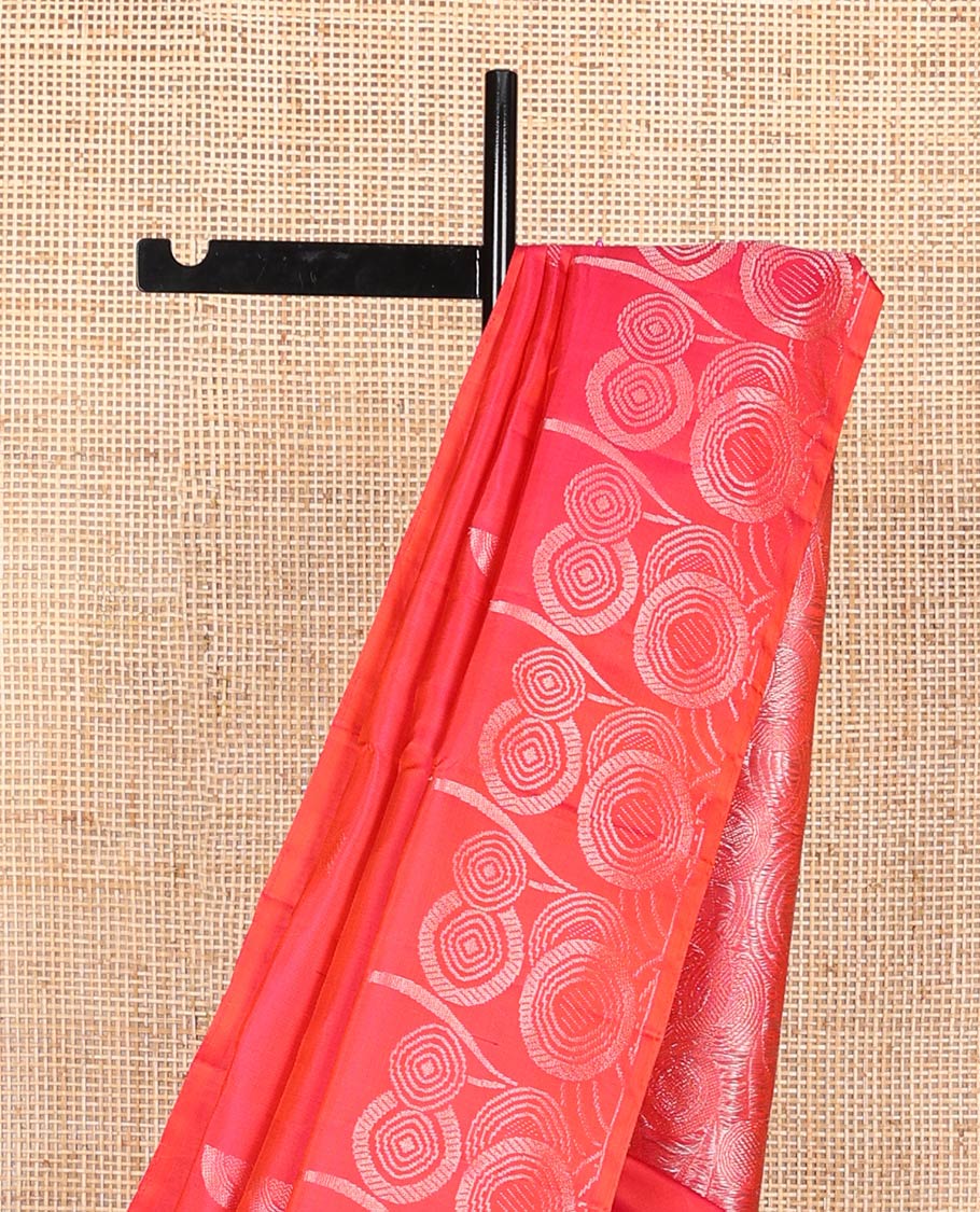 Red zari buttas soft silk saree, zari border, and pallu of intricate zari designs