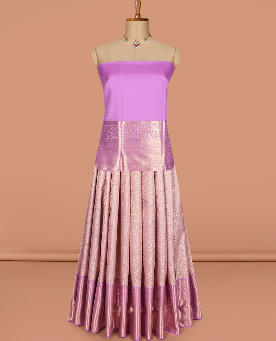 Pink pure-silk half-saree, jacquard skirt, contrast blouse, and border of rekku, poun, floral, kuyil kann, diamond, and then kuli kann designs, and intricate dhavani