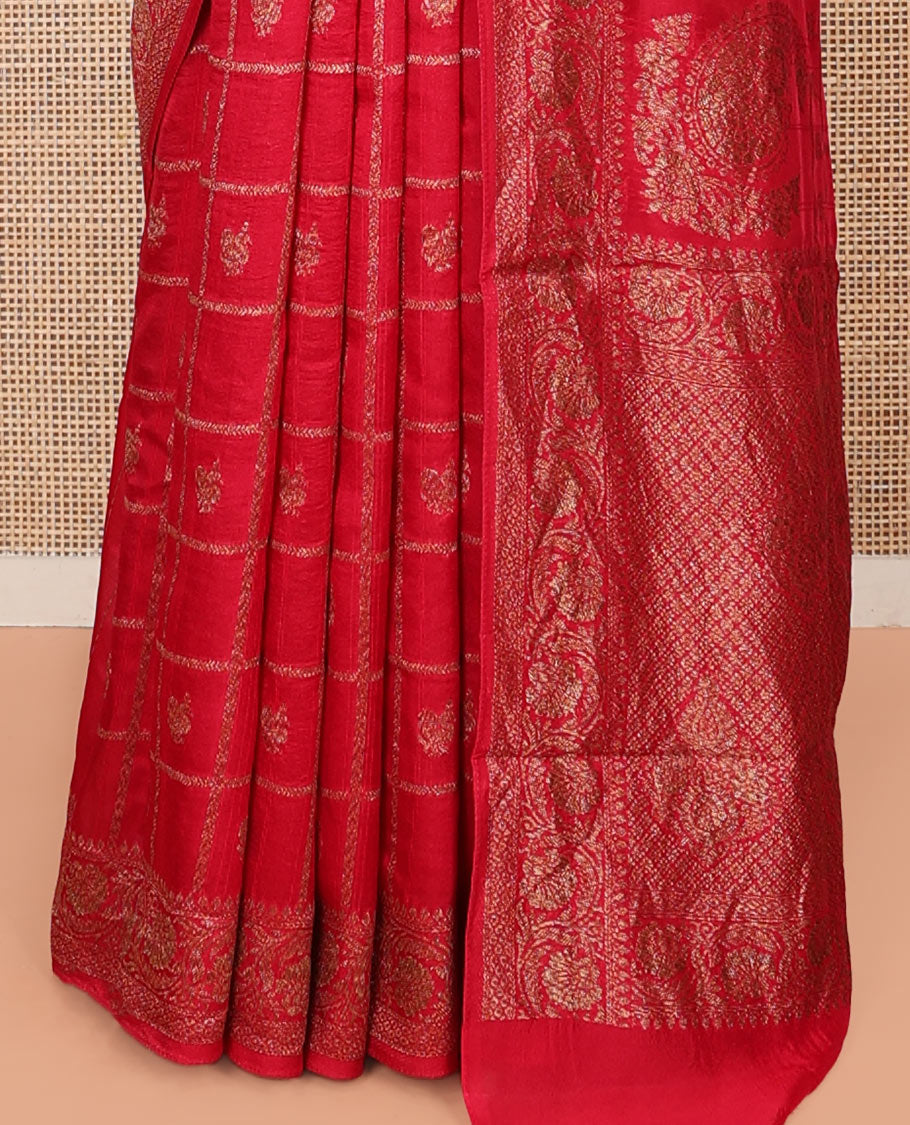 Red Matka Silk Saree, Prettified with Peacock Butta Enclosed Checks on Its Body, Highlighted by a Floral Creeper Design Border, Grand Pallu of Jaal Designs, and Paired with a Matching Blouse