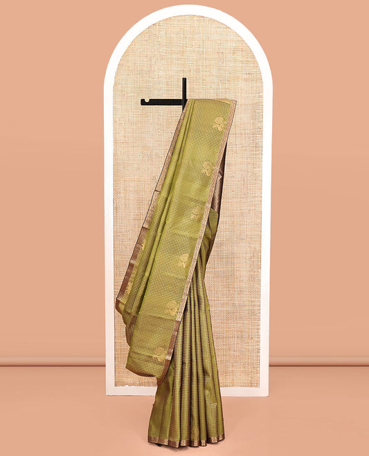 Green Vasundhara Lite Silk Mix Saree, Richly Steeped with Zari Buttas and Mayil Buttas On Its Body, Complemented by Captivating Contrast Piping Zari Border, Grand Jaal Pallu and Paired with a Contrast Blouse