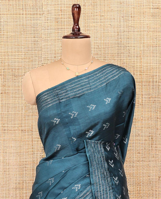 Blue Banana Pith Saree, Finely Crafted with Buttas All Over Its Body, Subtle Self-Border of Stripes and Buttas, Pallu Steeped with Stripes, and Paired with a Matching Blouse