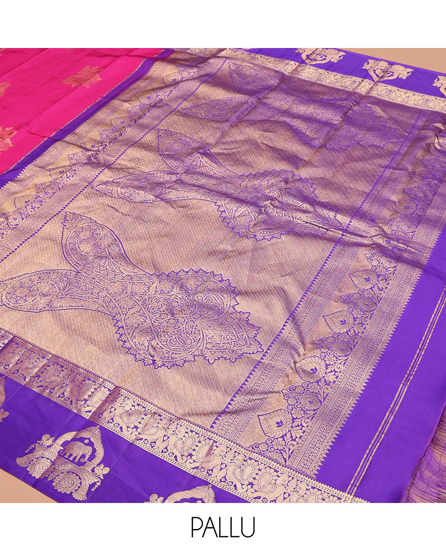 Pink Vasundhara Silk Saree Embellished with Zari Buttas All Over Its Body, Highlighted by Contrast Zari Border of Rekku, Mayil, and Chariot Designs, a Grand Pallu of Diagonal Stripes, and Paired with a Contrast Blouse