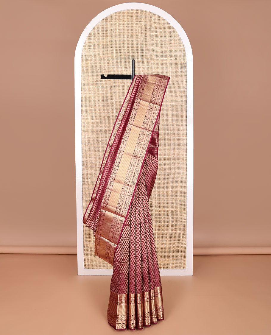 Maroon jaal design kancheepuram silk saree with self border of paun, muthu, kuyil kann design & floral pallu