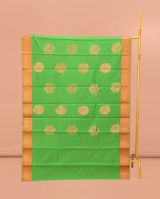 Green Semi-Silk Cotton Saree, Dazzled with Zari Buttas All Over Its Body, Highlighted by a Zari Traditional Design Border, Complemented by a Contrast Pallu of Geometric Design, and Paired with a Contrast Blouse