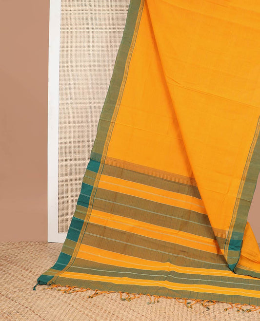 Orange coimbatore cotton saree with contrast temple border & striped pallu