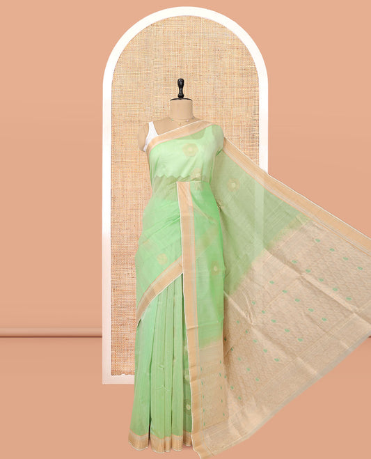 Light Pista Green Silk Cotton Saree, Subtly Sparkled with Zari Buttas, Contrast Zari Border, Intricate Pallu, and a Contrast Blouse