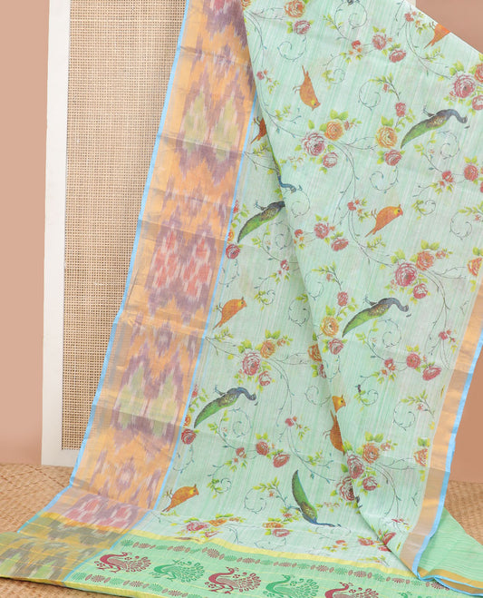 Light green floral, bird motifs chirala cotton saree with contrast ikkat style border & peacock design pallu
