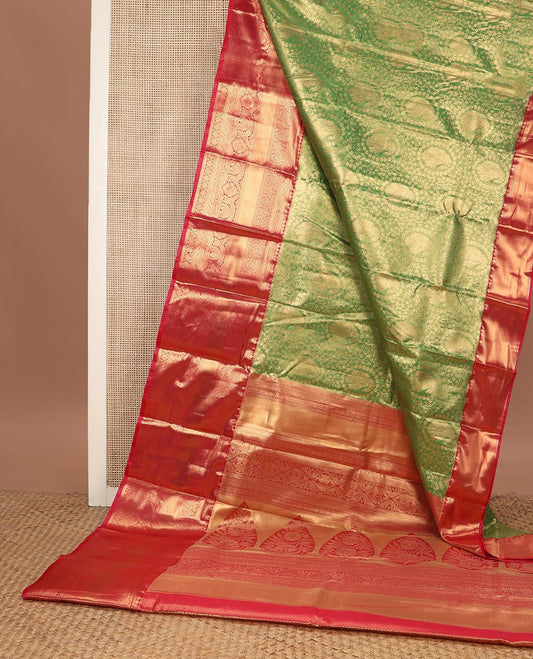 Green floral jacquard budget silk saree, contrast traditional zari border, and intricate zari woven pallu