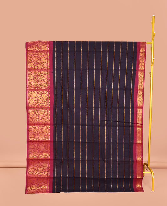 Blue Sungudi Cotton Saree, Elevated with Stripes on Its Body, Complemented by a Contrast Border of Round Peacock and Floral Vine Designs, Zari Striped Pallu, and Has No Blouse
