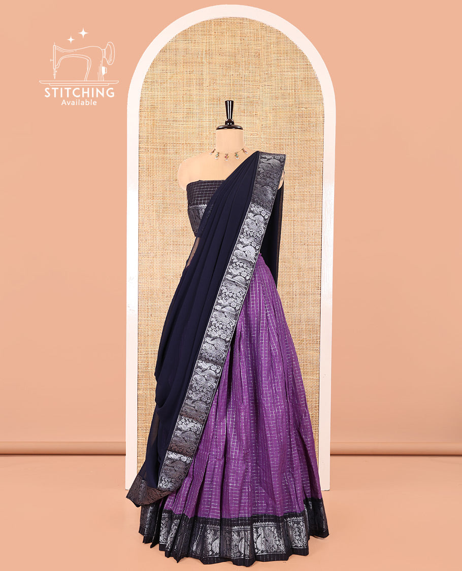 Purple and Navy Blue Sungudi Cotton Half-Saree, Gleamed Up with Micro-Zari Checks on Its Skirt, Complemented by a Contrast Peacock Zari Border, Paired with a Contrast Blouse, and a Contrast Syska Georgette Zari-Bordered Dhavani