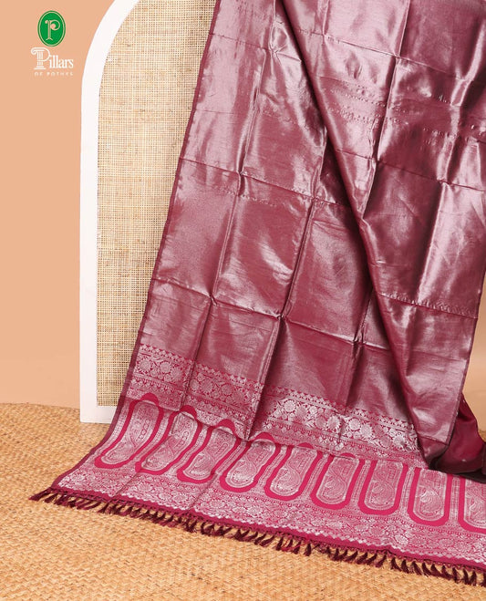 Wine color silver zari tissue sailk saree with plain border & rich pallu along with butta design blouse