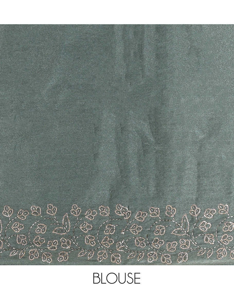 Grey Designer Saree, Enthralled with Stone Work All Over Its Body, a Scallop Floral Embroidered Border, and Matching Blouse