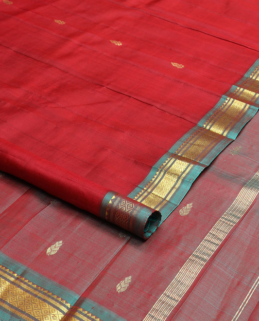 Red zari buttas kanchipuram silksaree, contrast one-sided border of thazampoo rekku & mayil kann design & zari design pallu