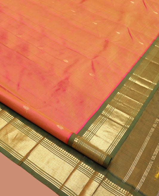 Orange Kanchipuram Silk Saree, Embellished with Zari Buttas, a Contrast One-Sided Border of Panner Sombu, Muthu, Bananras, and Mayil Kann, Zari Design Pallu, and No Blouse