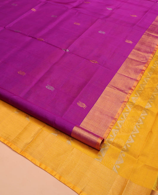 Rani Pink Uppada Silk Saree, Decorated with Zari Buttas All Over Its Body, Complemented by a Contrast Plain Border, Pallu Features Peacock Designs, and Paired with a Contrast Blouse