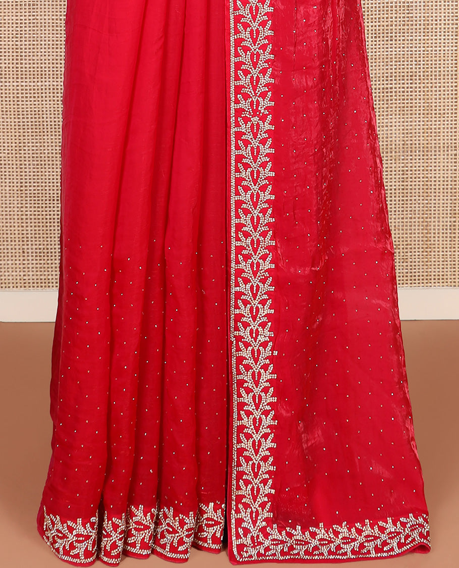 Red stone work designer saree, floral motifs micro-stone work border
