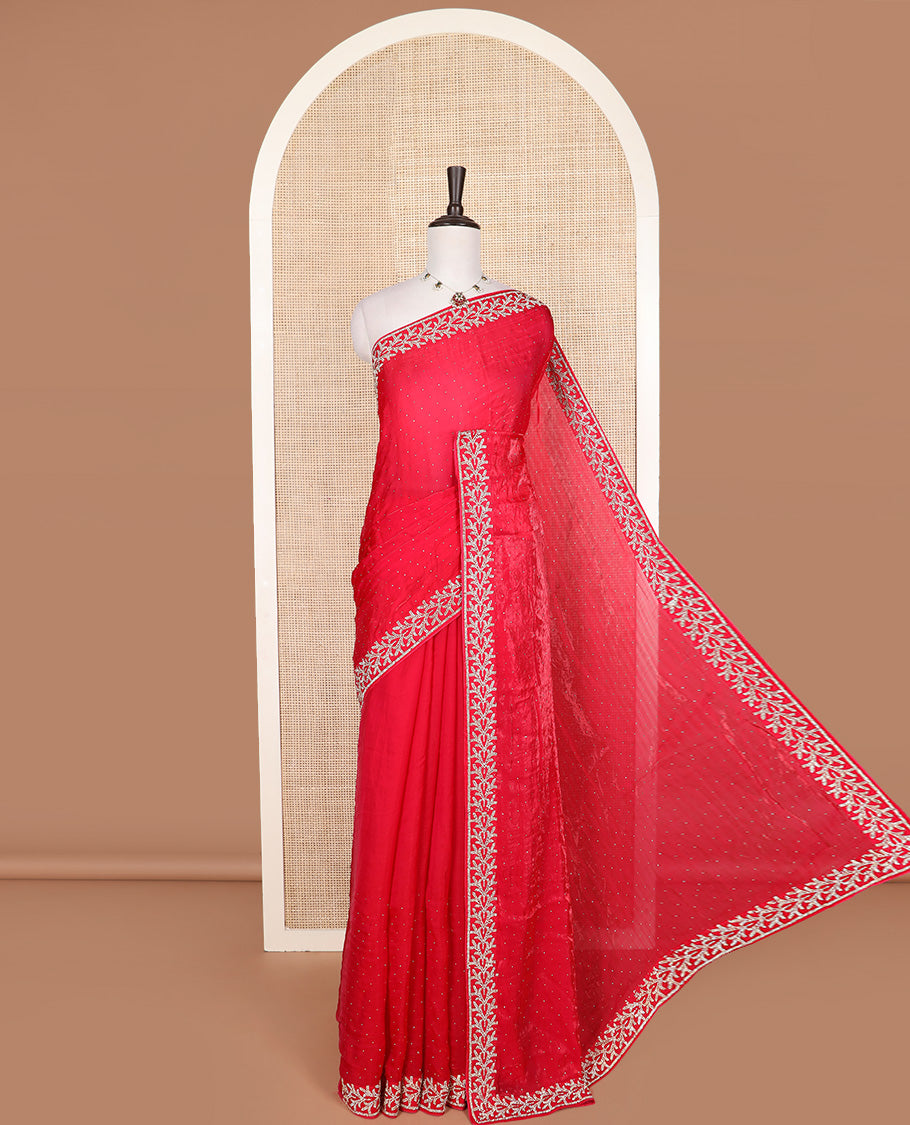 Red stone work designer saree, floral motifs micro-stone work border