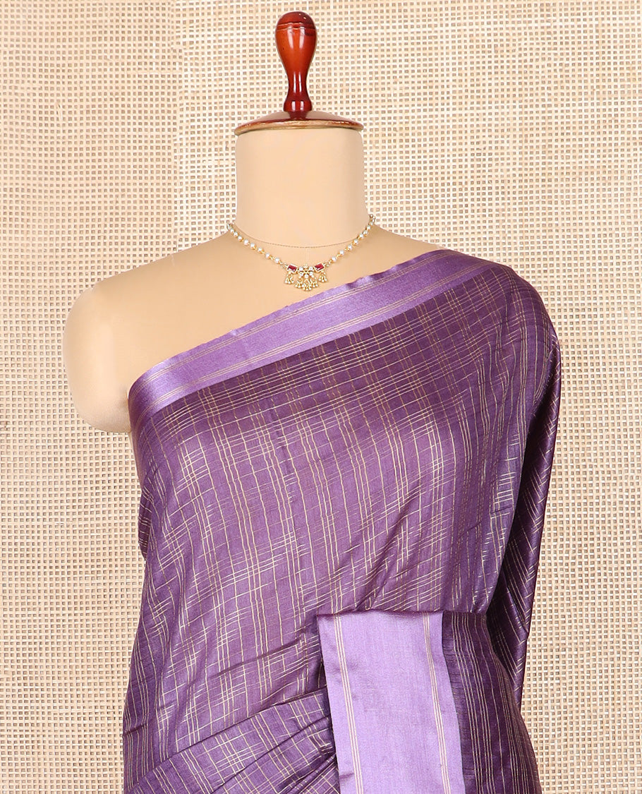 Purple checked tussar saree, contrast striped border, and self-pallu