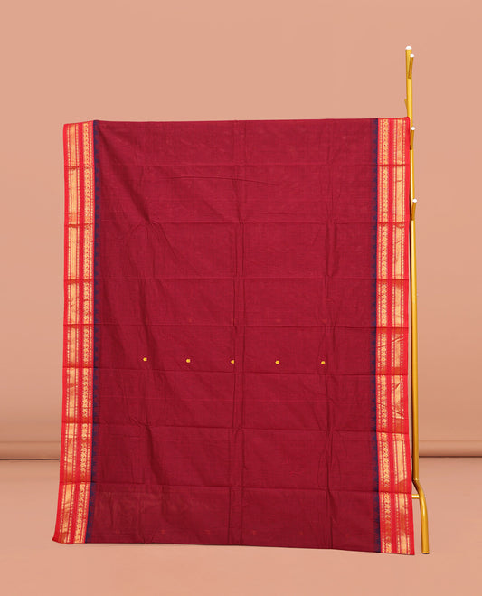 Red Chettinad Cotton Saree, Adorned with Buttas on Its Body, Complemented by a Contrast Traditional Zari Design Woven Border, Pallu of Stripes and Buttas, and Paired with a Matching Blouse