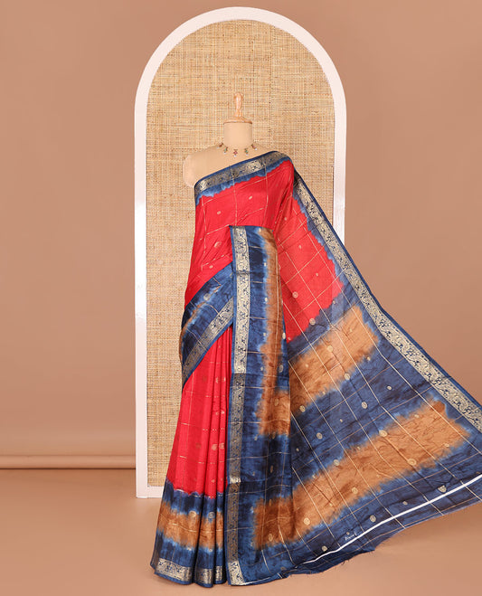 Red buttas enclosed checked dola silk saree, contrast shibori print with traditional zari border, buttas enclosed checked pallu, and a contrast buttas enclosed checked blouse